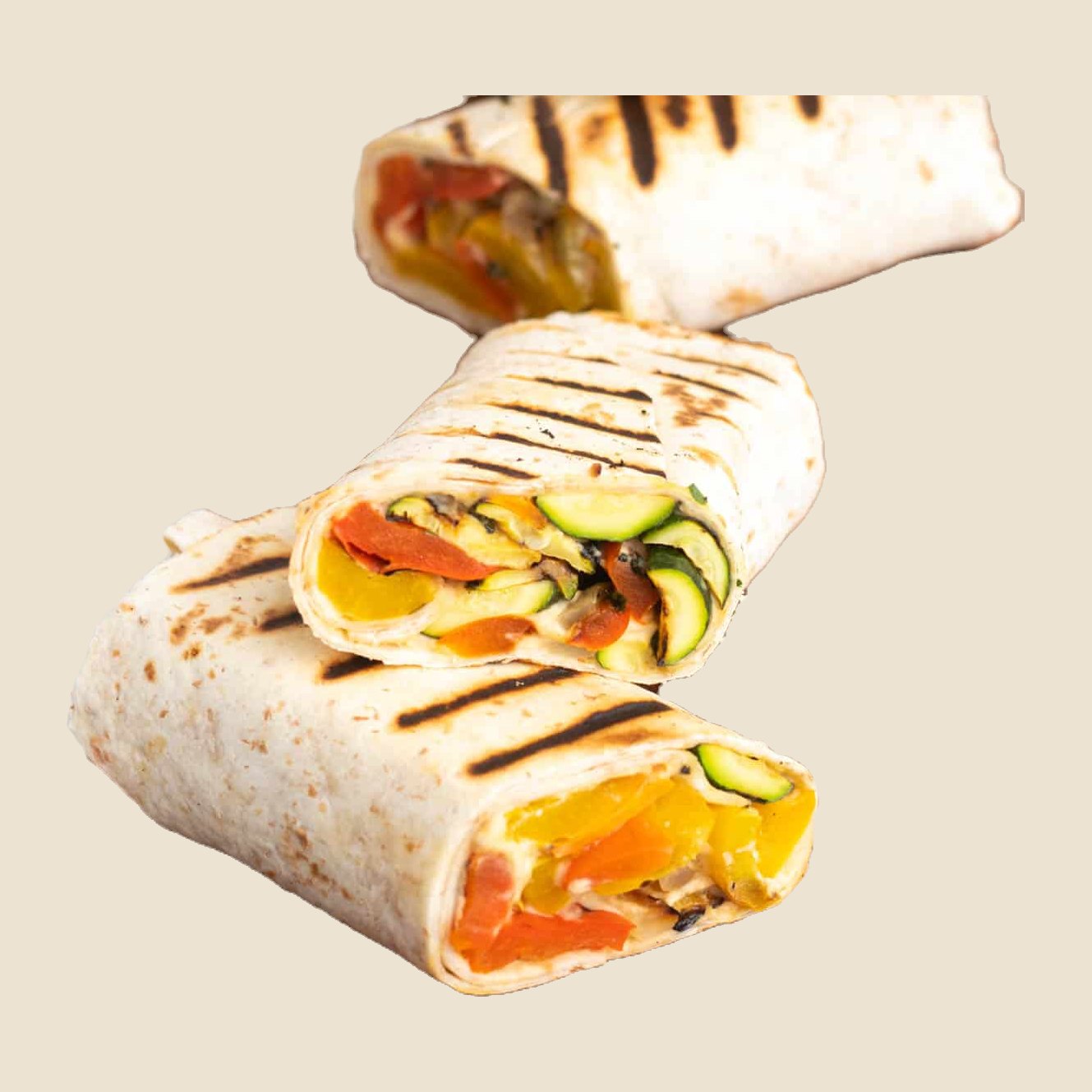 Grilled vegetable wrap cut in half